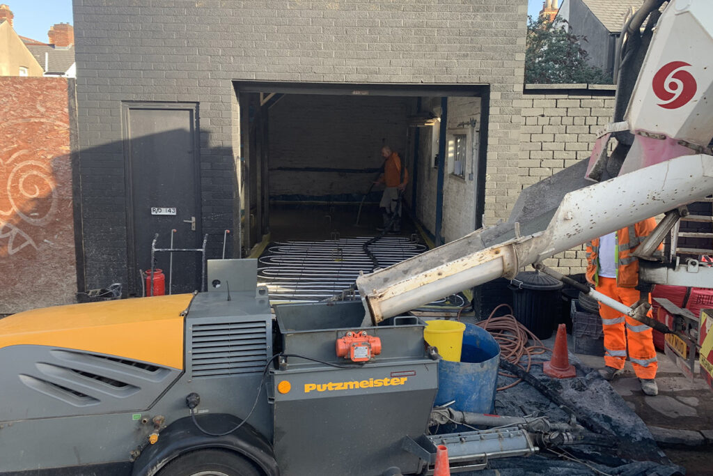 LSS's trusty Putzmeister hard at work pumping the screed.Liquid Screeding at CARDIFF GARAGE TO ART STUDIO CONVERSION
