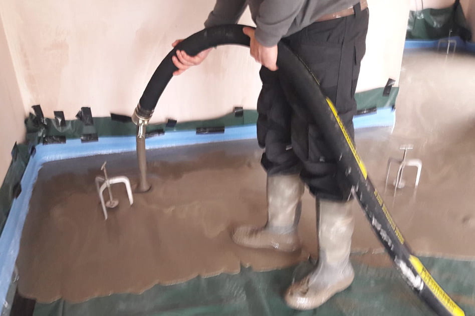 Pour of Belitex quick dry screed