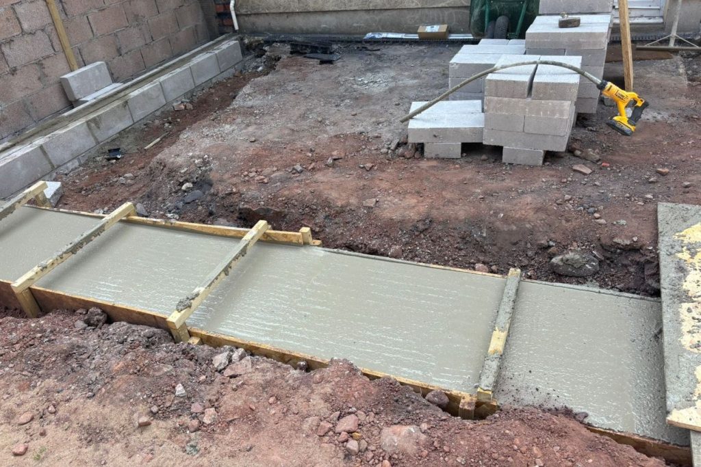 CONCRETE FOOTINGS POURED IN RISCA